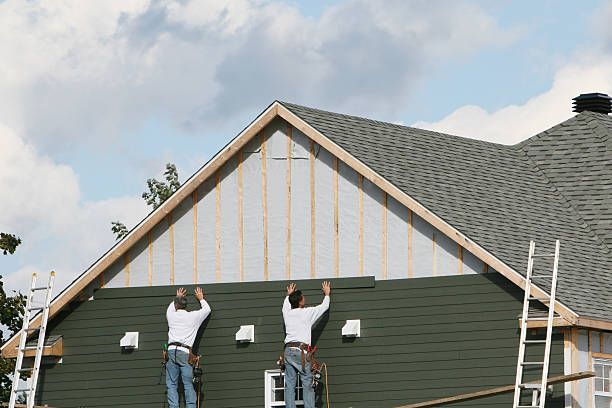Professional Siding Installation technician working in Bridgeport, WA